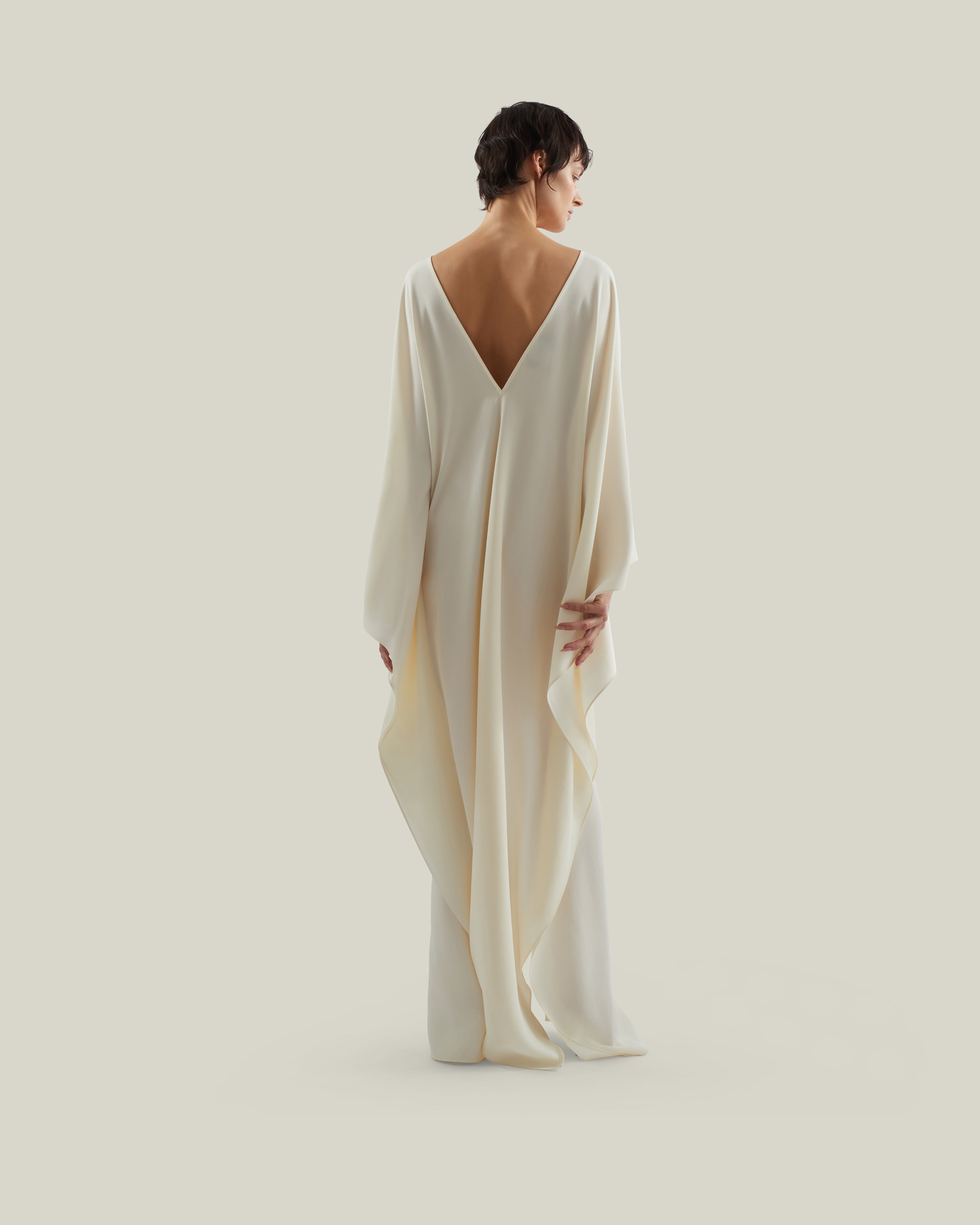 Sahara Kaftan in Ivory - Crepe cady laced-up plunge neckline kaftan with frontal slit