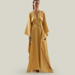 Mojave Kaftan in Antique Gold - Three-dimensional lurex pin stripe laced-up neckline belted kaftan with pockets