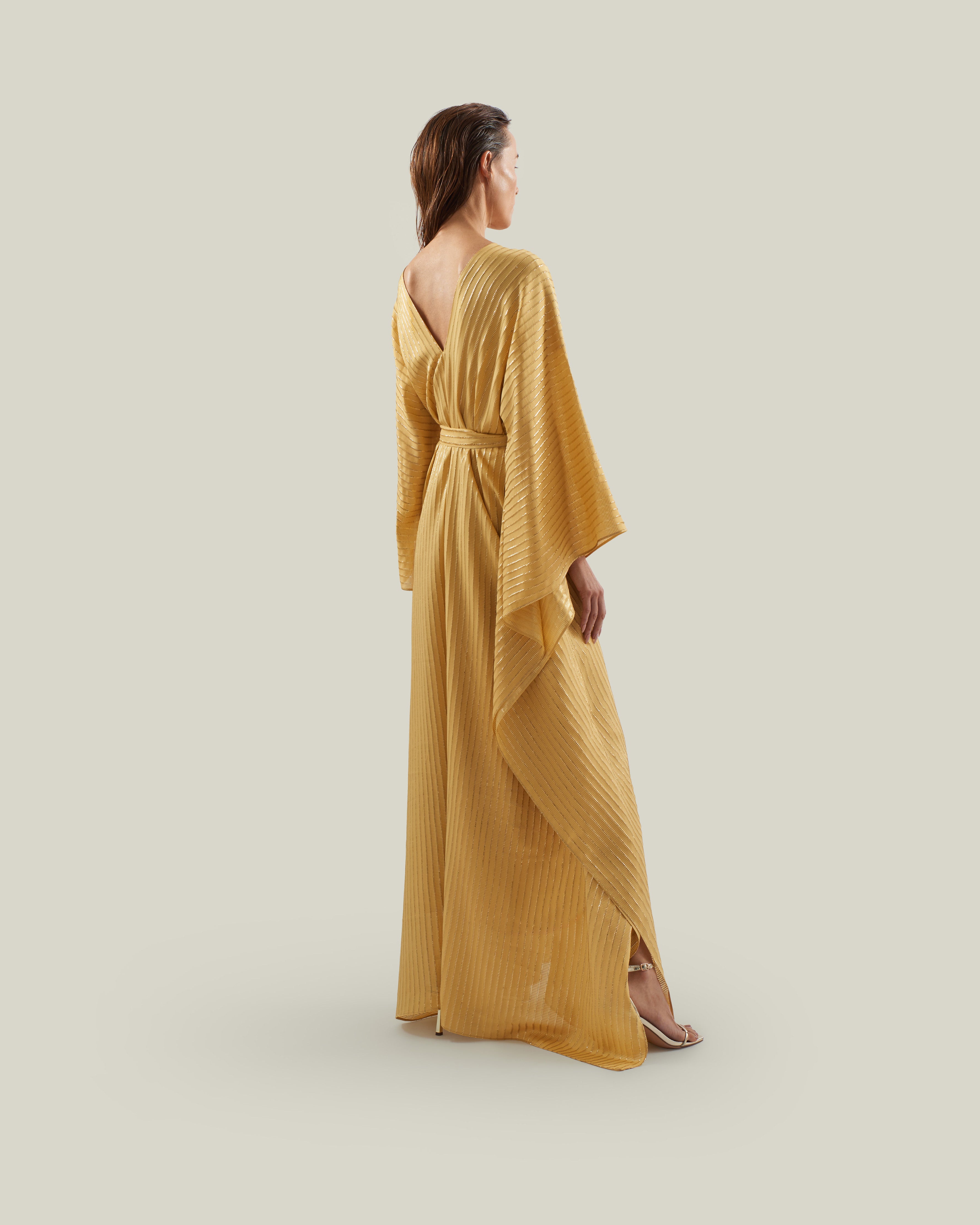 Mojave Kaftan in Antique Gold - Three-dimensional lurex pin stripe laced-up neckline belted kaftan with pockets