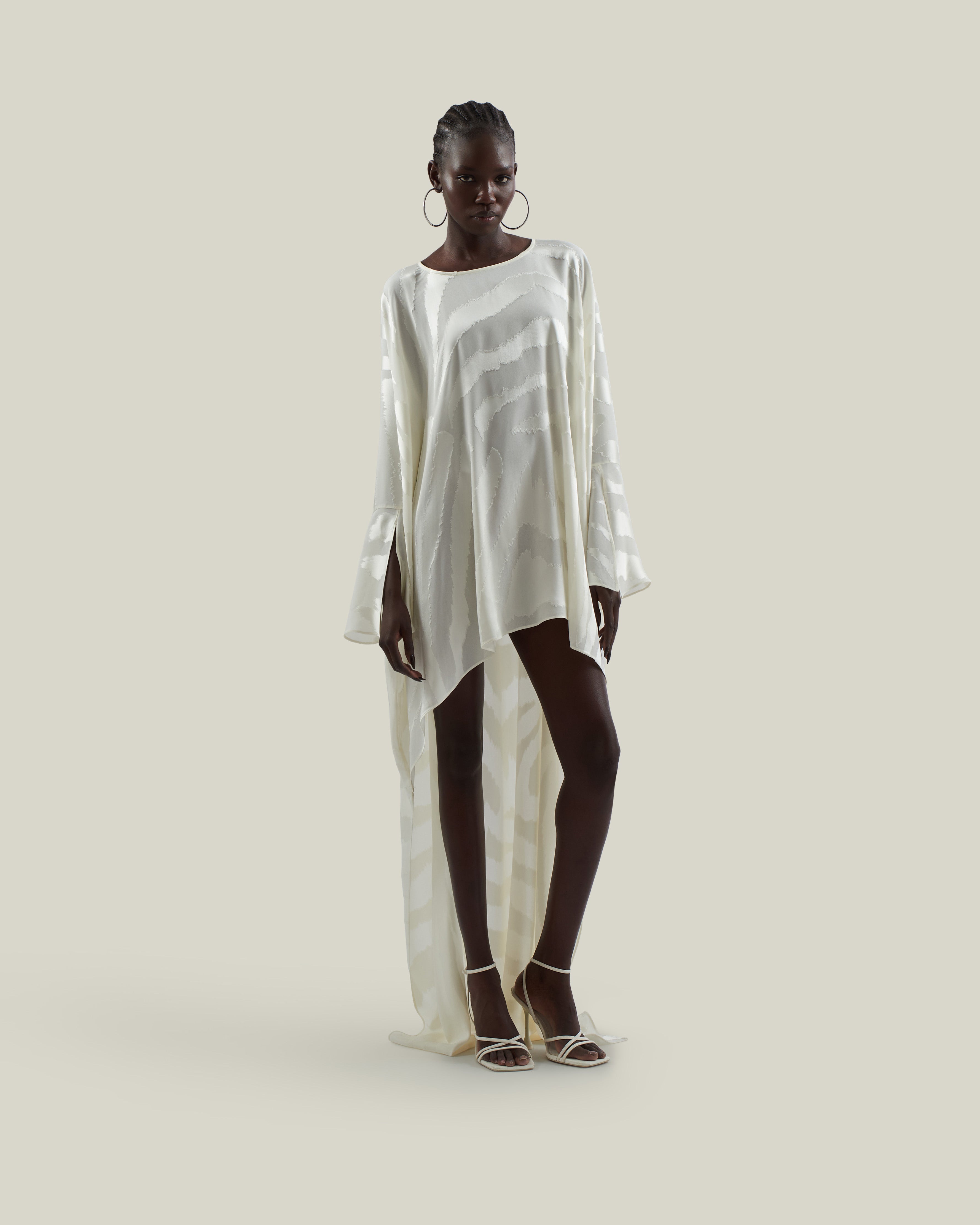 Thar Kaftan in Ivory - Zebra motif fil coupè high-low hem short kaftan with cuffs