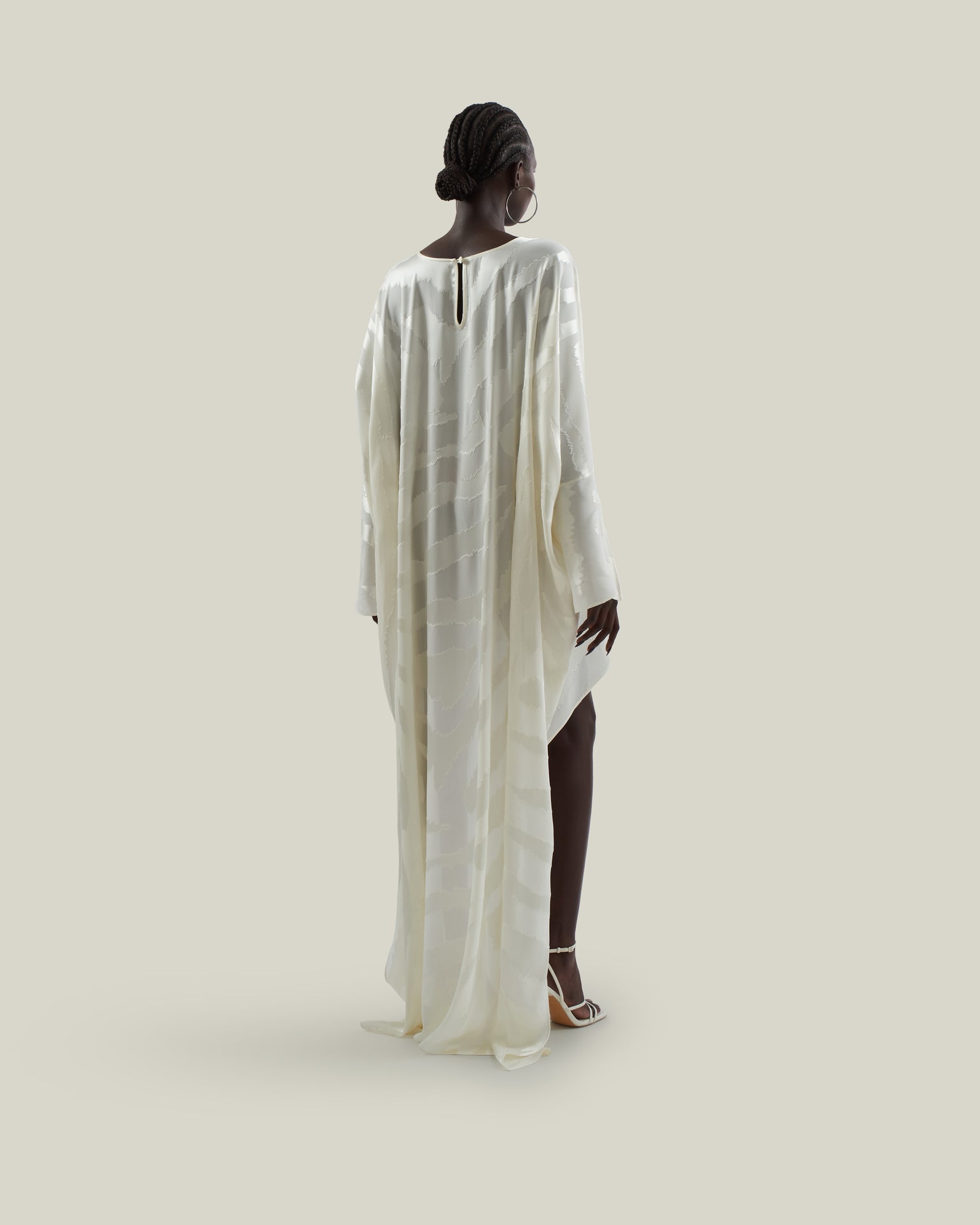 Thar Kaftan in Ivory - Zebra motif fil coupè high-low hem short kaftan with cuffs