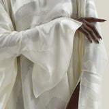 Thar Kaftan in Ivory - Zebra motif fil coupè high-low hem short kaftan with cuffs