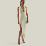 Sahara Dress in Ivory - Laced-up plunge neckline dress with hand-tied fringed hem and side slit
