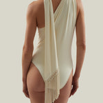 Siwa Swimsuit in Ivory - Gathered one shoulder swimsuit with scarf and dettached hand-tied fringe-trimmed mini pareo set