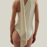 Siwa Swimsuit in Ivory - Gathered one shoulder swimsuit with scarf and dettached hand-tied fringe-trimmed mini pareo set