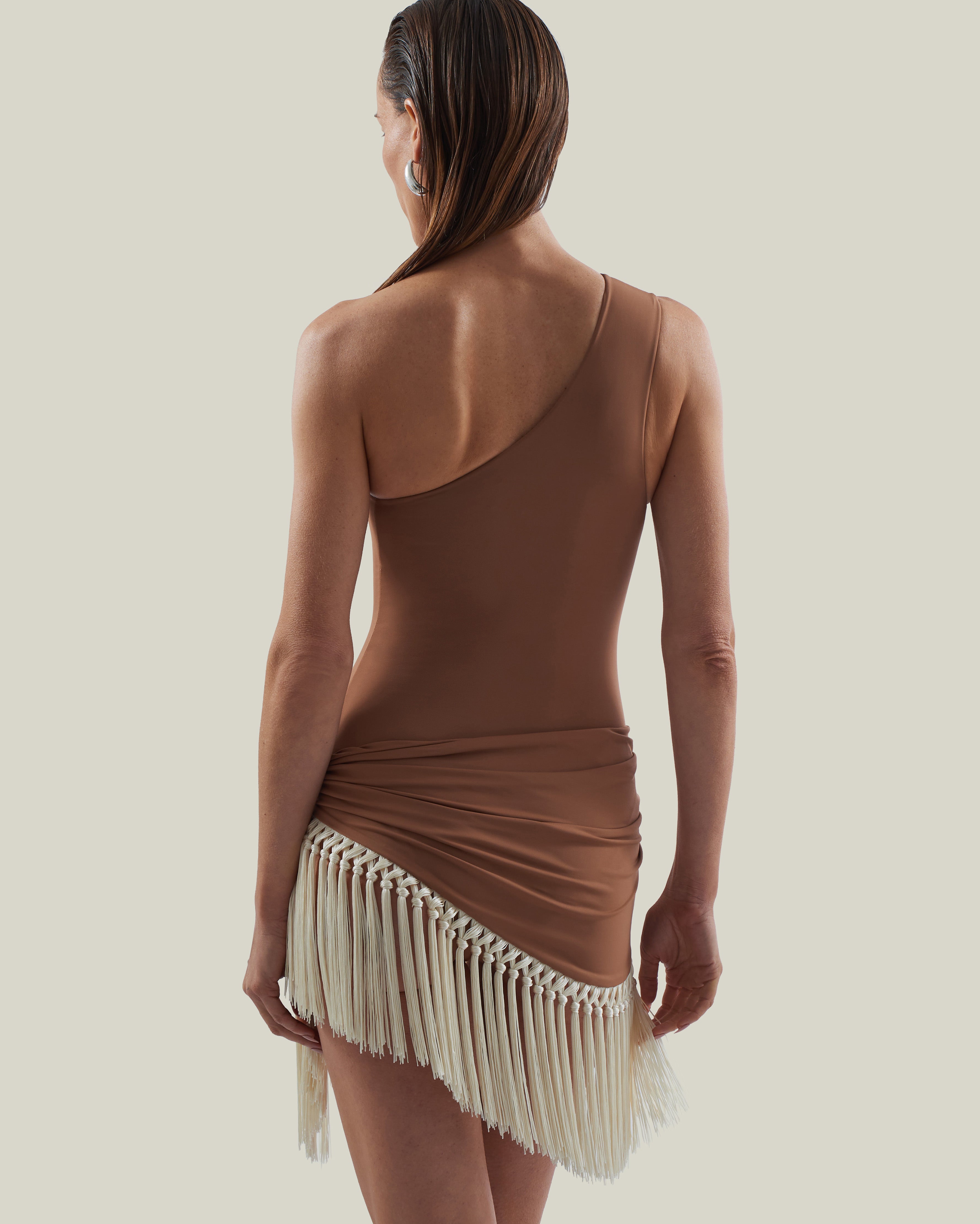 Yacare Swimsuit in Camel-Ivory - One shoulder swimsuit and dettached hand-tied fringed trimmed mini pareo set