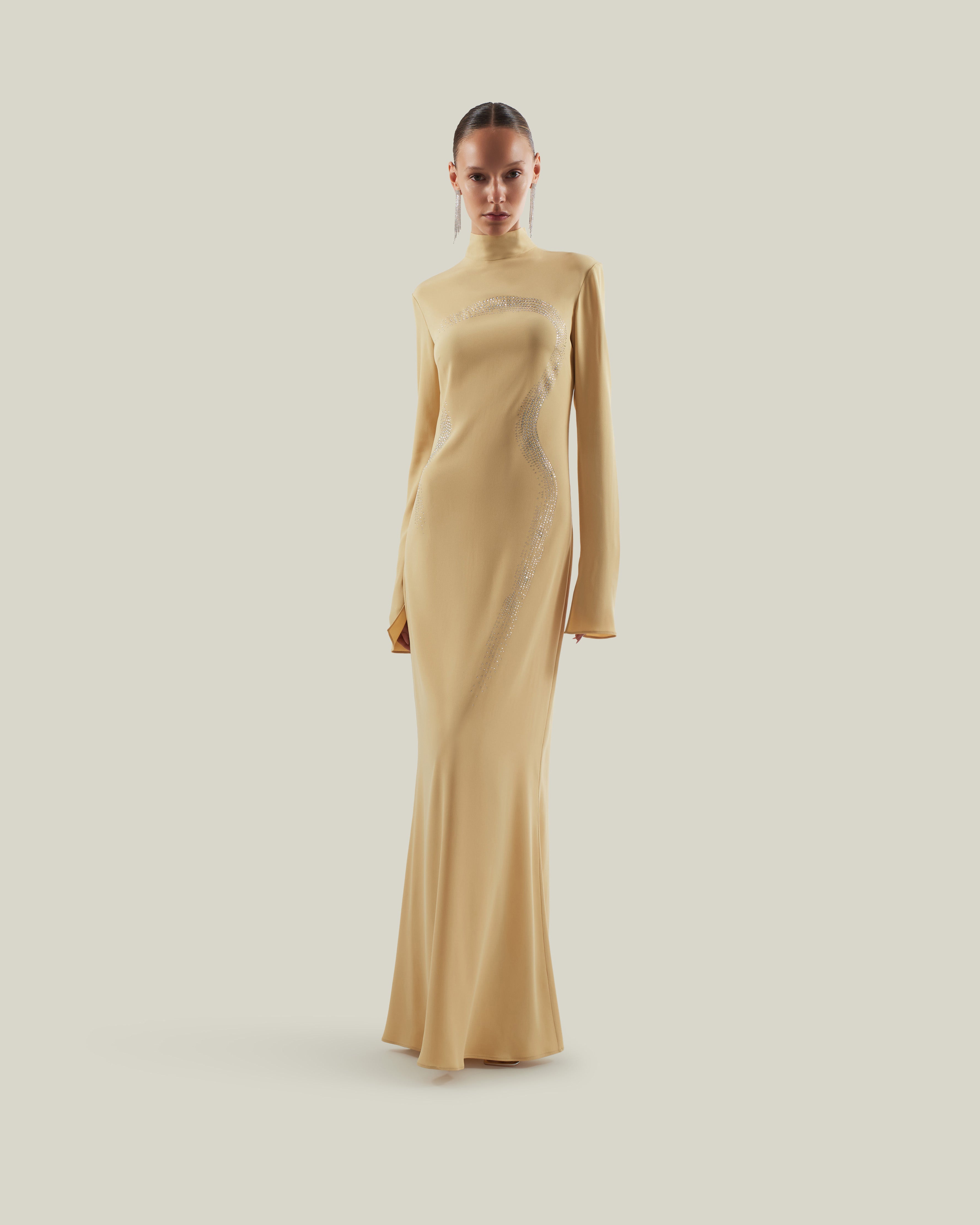 taller marmo gold dress Taller Marmo unveils Heat, its Summer 2026 collection, a deliberate palate cleanser marking a shift toward restraint and texture. A tightly edited palette of camel, smoke, cocoa, and ivory is punctuated by