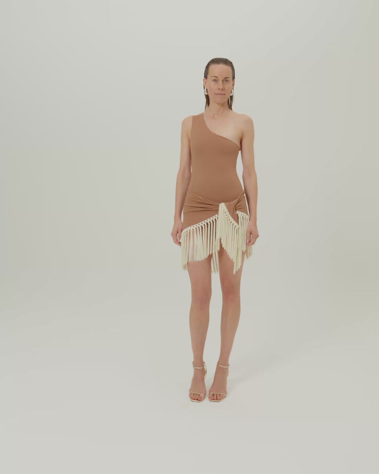 Yacare Swimsuit in Camel-Ivory - One shoulder swimsuit and dettached hand-tied fringed trimmed mini pareo set