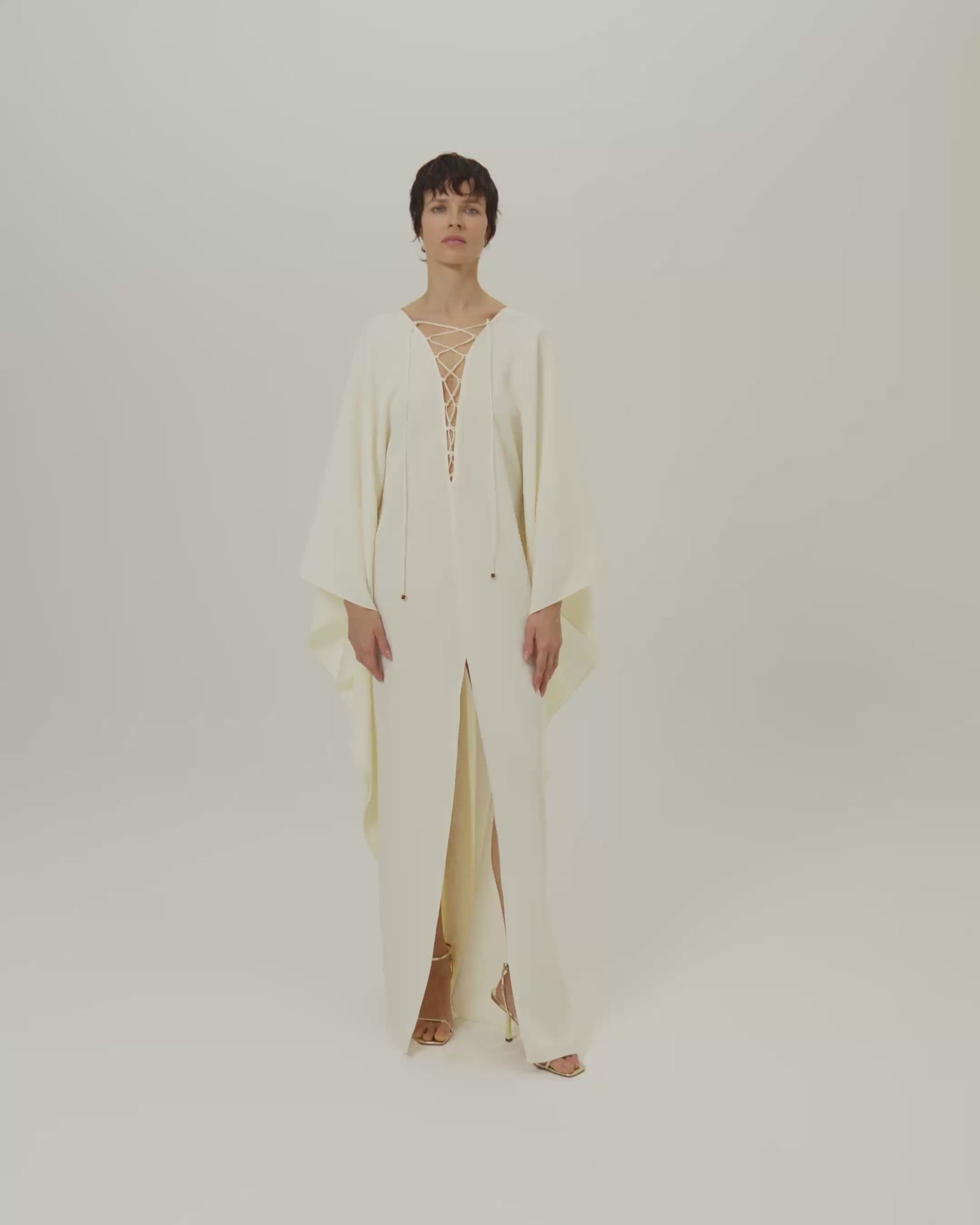 Sahara Kaftan in Ivory - Crepe cady laced-up plunge neckline kaftan with frontal slit