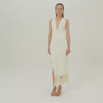 Sahara Dress in Ivory - Laced-up plunge neckline dress with hand-tied fringed hem and side slit